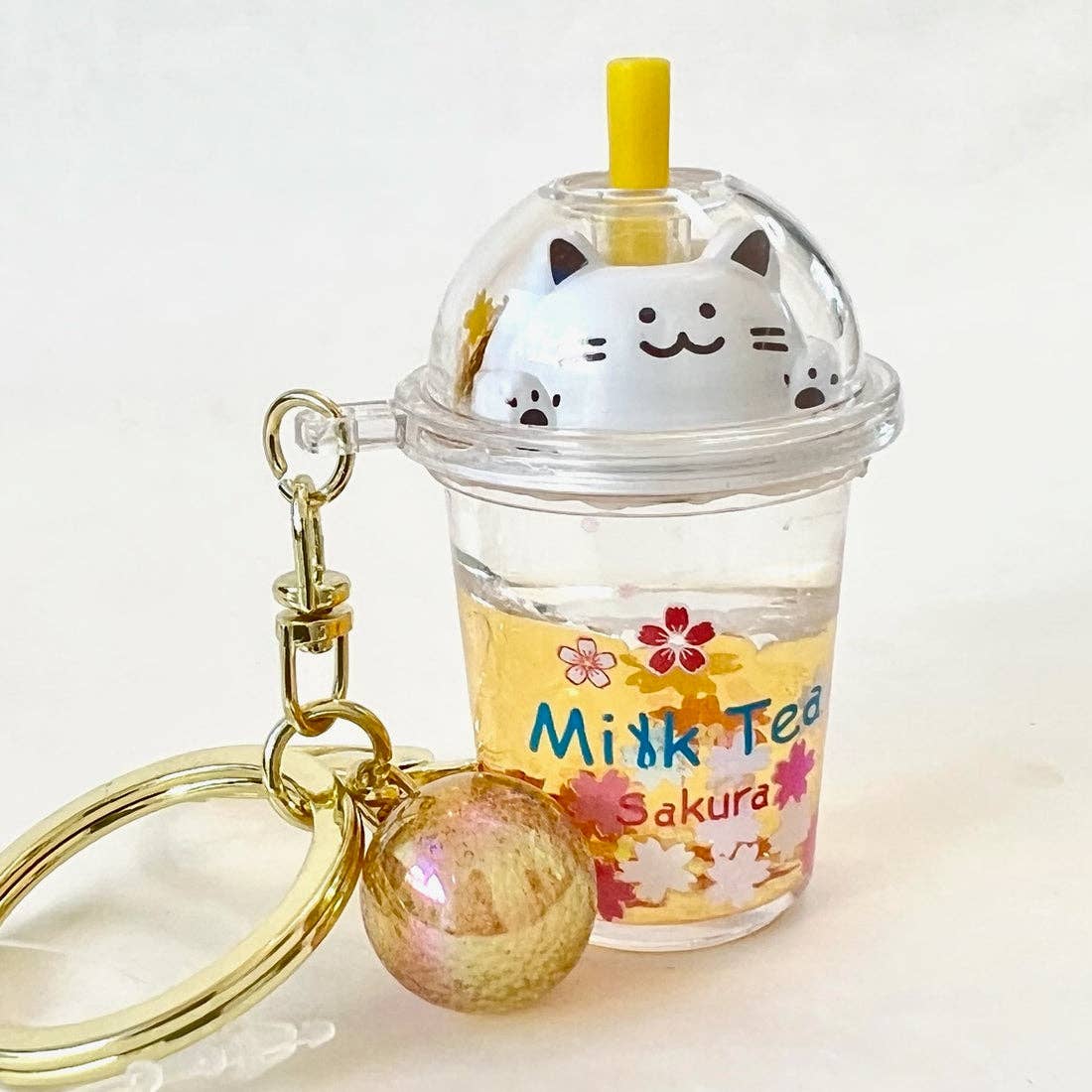 12078 Kitty Milk Tea Floaty Key Charm