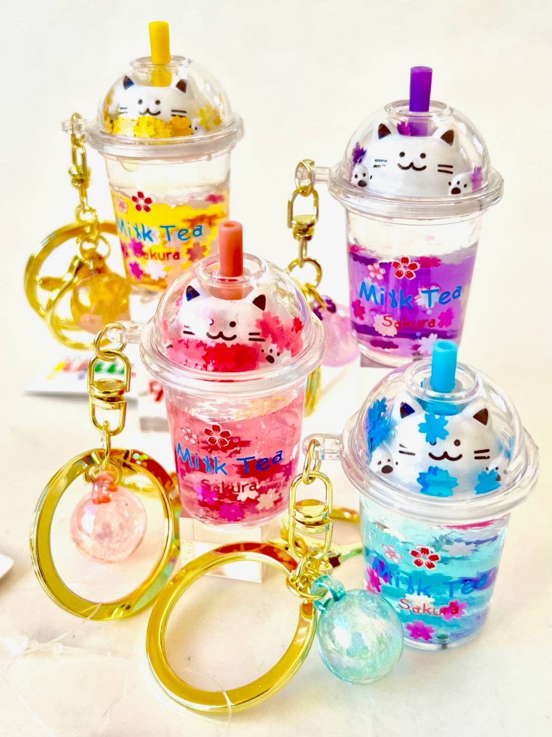 12078 Kitty Milk Tea Floaty Key Charm